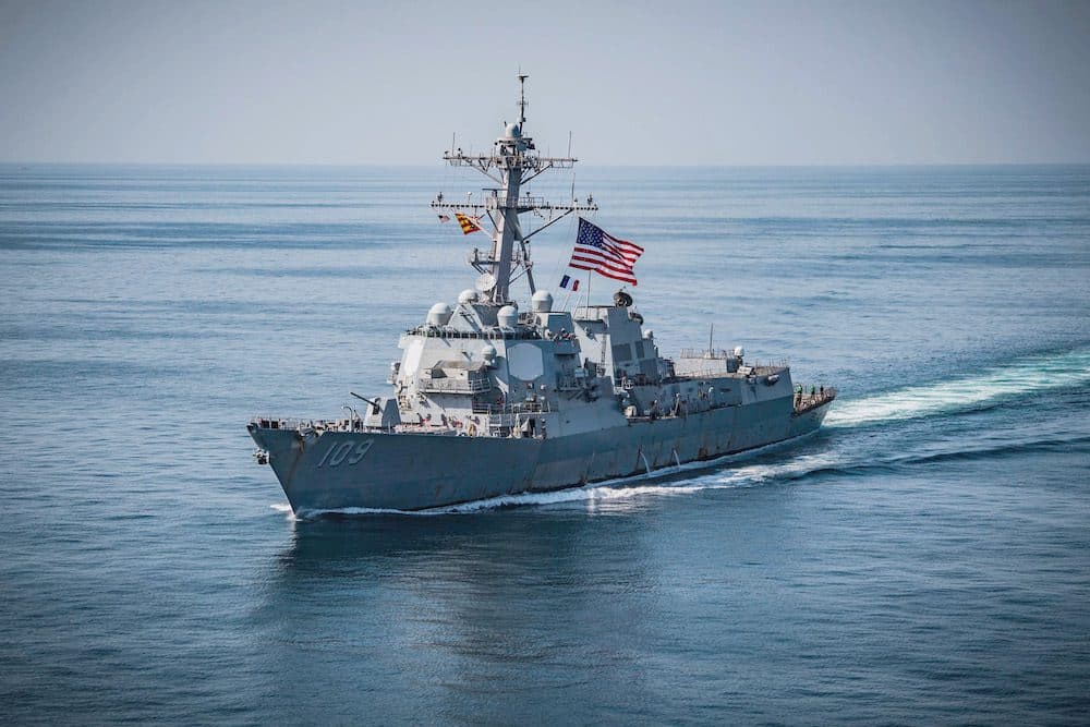 181108-N-UX013-1146 ARABIAN GULF (Nov. 8, 2018) The guided-missile destroyer USS Jason Dunham (DDG 109) flies the battle ensign and the flag of France during a three week integration of the French navy La Fayette-class frigate FS Courbet (F 712) with Task Force 55. Jason Dunham is deployed to the U.S. 5th Fleet area of operations in support of naval operations to ensure maritime stability and security in the Central Region, connecting the Mediterranean and the Pacific through the western Indian Ocean and three strategic choke points. (U.S. Navy photo by Mass Communication Specialist 3rd Class Jonathan Clay/Released)