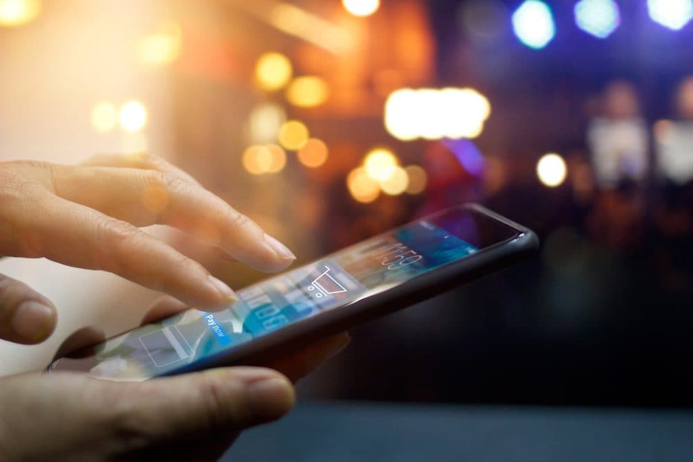 Mobile payment, Man using mobile payments online shopping and icon on night background, All on screen are design up. (Mobile payment, Man using mobile payments online shopping and icon on night background, All on screen are design up., ASCII, 117 comp