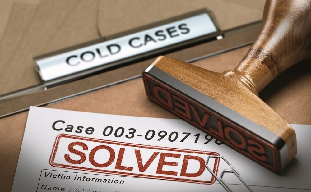 3D illustration of a cold case file with a rubber stamp and the word solved. concept of successful police investigations (3D illustration of a cold case file with a rubber stamp and the word solved. concept of successful police investigations, ASCII,