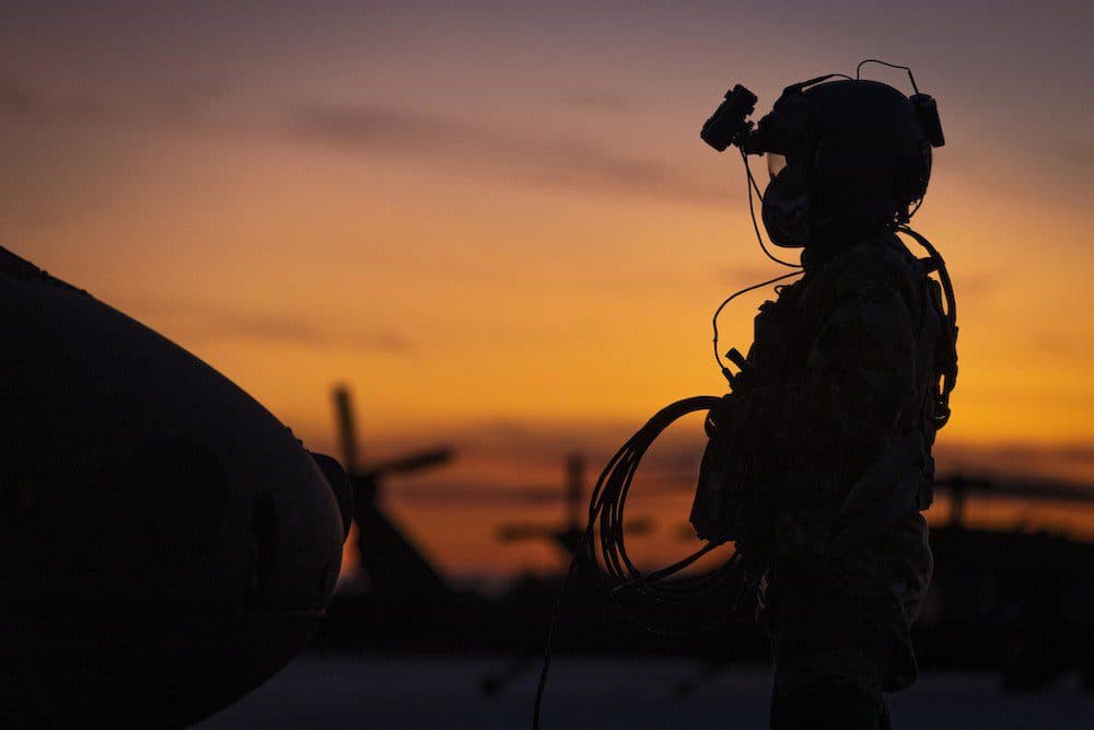 U.S. Army Sgt. Joseph Koszyk, a UH-60M Black Hawk helicopter crew chief with the New Jersey National Guard’s 1-150th Assault Helicopter Battalion, prepares his aircraft for a night training mission at Joint Base McGuire-Dix-Lakehurst, N.J., Sept. 18, 2019. (U.S. Air National Guard photo by Master Sgt. Matt Hecht)