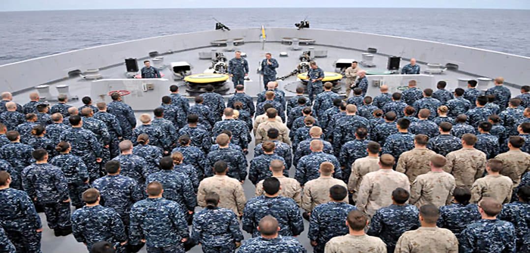 110818-N-GW695-584 INDIAN OCEAN (Aug. 18, 2011) Cmdr. Kevin Meyers, commanding officer of the amphibious transport dock ship USS Green Bay (LPD 20), addresses Sailors and Marines during an all-hands call on the focÕsle of the ship. Green Bay and the embarked 13th Marine Expeditionary Unit (13th MEU) are underway in the U.S. 7th Fleet area of responsibility during Green BayÕs first western Pacific deployment. (U.S. Navy photo by Mass Communication Specialist 3rd Class Stephen M. Votaw/Released)