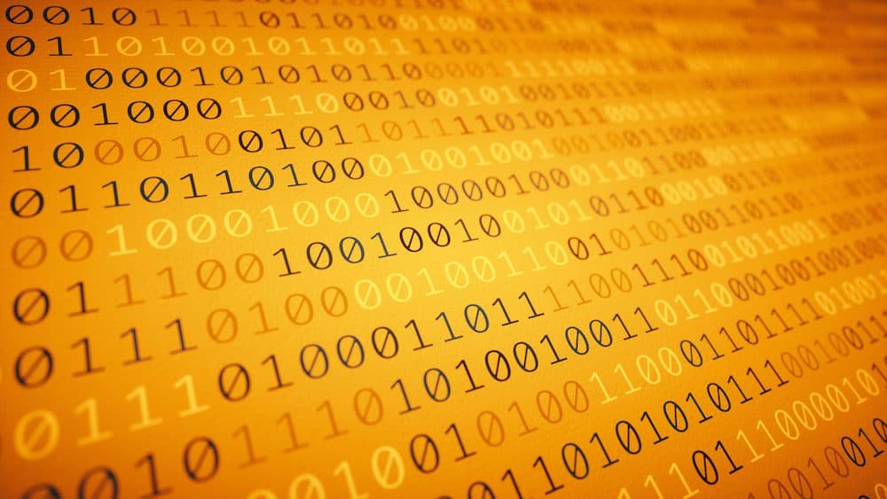 A front view on a blue spreadsheet with encrypted computer data. Image: matejmo/iStock