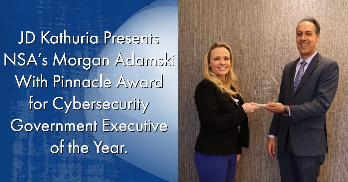 WashingtonExec's JD Kathuria presents NSA's Morgan Adamski with a Pinnacle award.