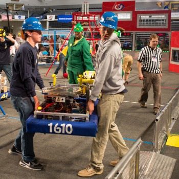 A team from last year's FIRST Robotics Competition transports the project it assembled. This year's event is set for March 28. 