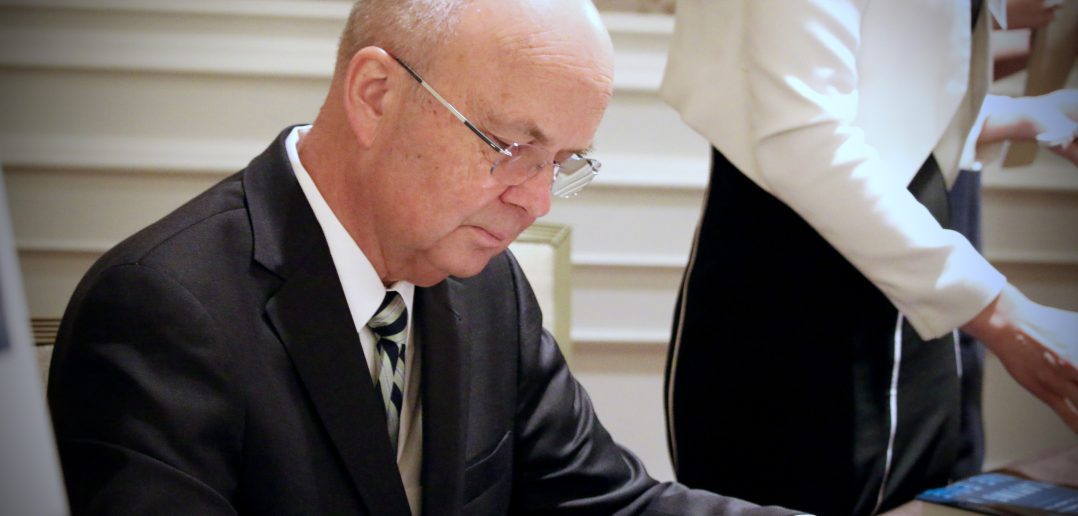 Photo of General Michael V Hayden Signing His Book, Playing to The Edge, at a WashingtonExec Event