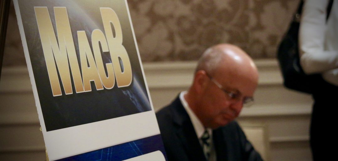 Photo of General Michael V Hayden Signing His Book, Playing to The Edge, at a WashingtonExec Event