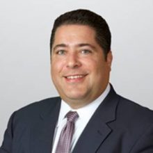 Adam August, Partner with Holland & Knight LLP